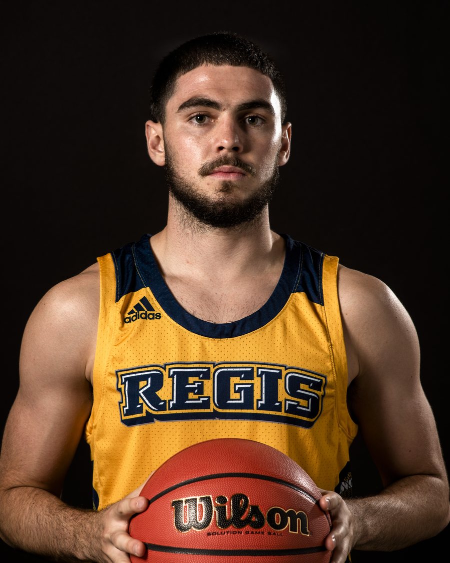 Shane van Huizen in his Regis University basketball uniform